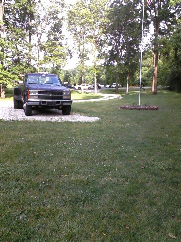 How do you fly a flag at half mast using a telescoping flag pole