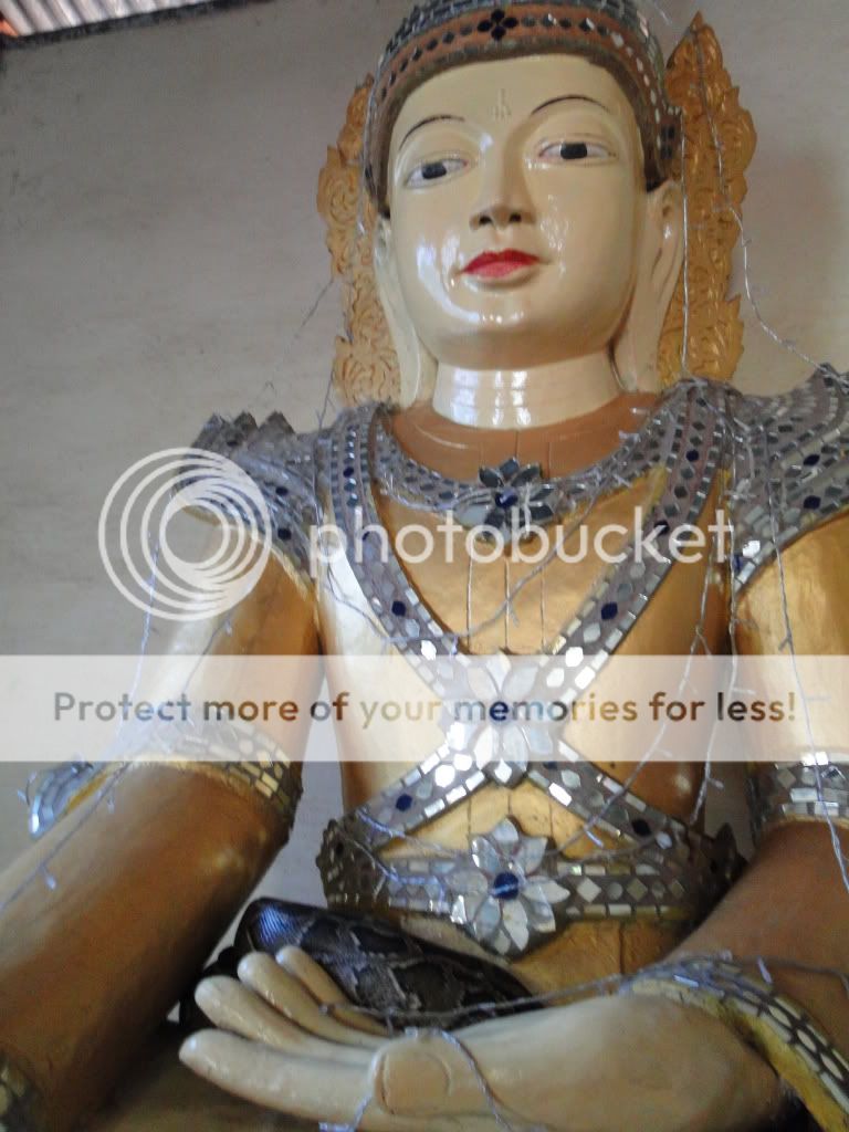 Buddha cupping a python.  Oh, Myanmar.